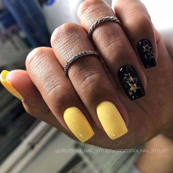 Żółto czarne paznokcie z wzorkami